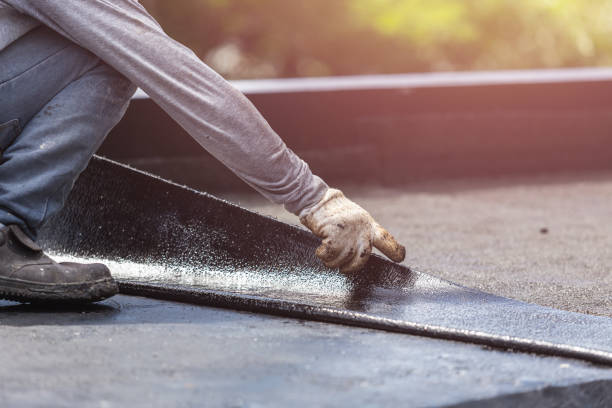 Professional Waterproofing technician working in Sheridan, MI